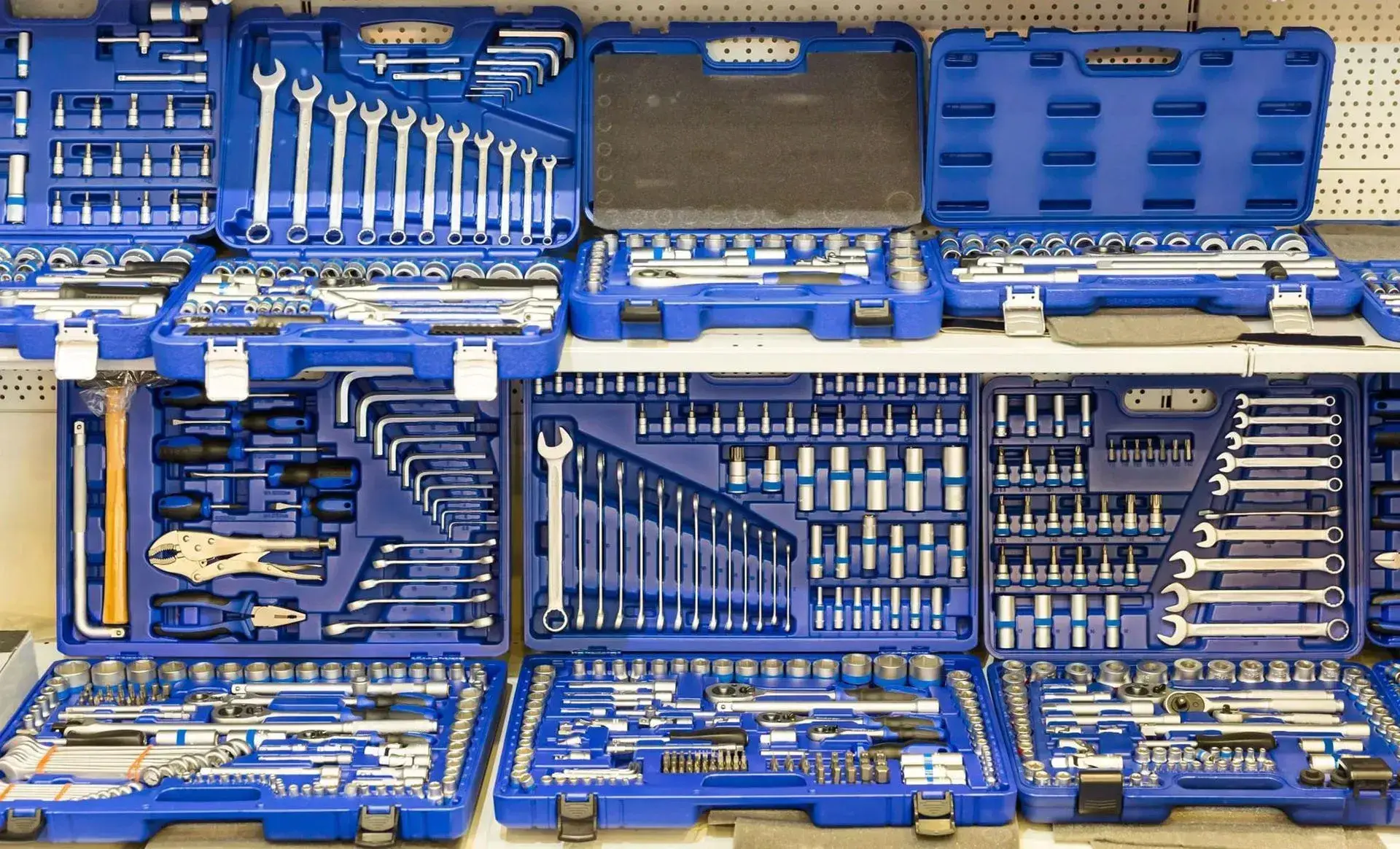 Blue cases of socket and wrench sets on store shelves